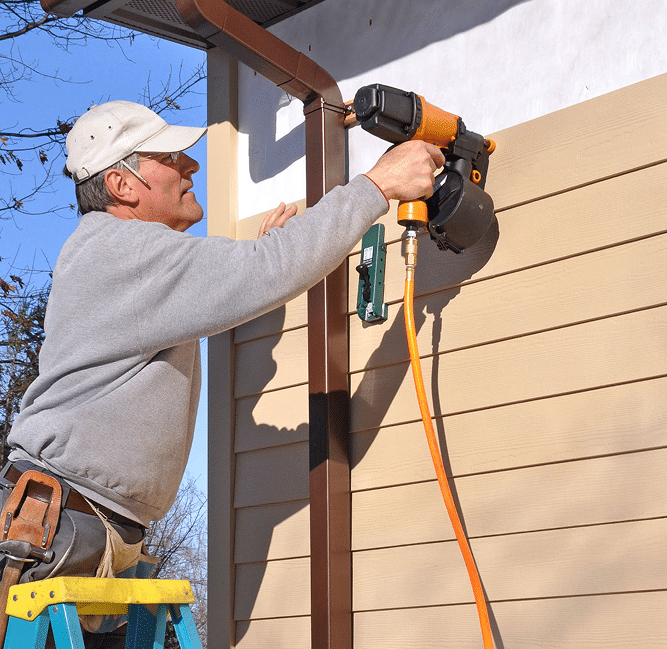 Nelson Exterior siding contractor in a process of siding replacement