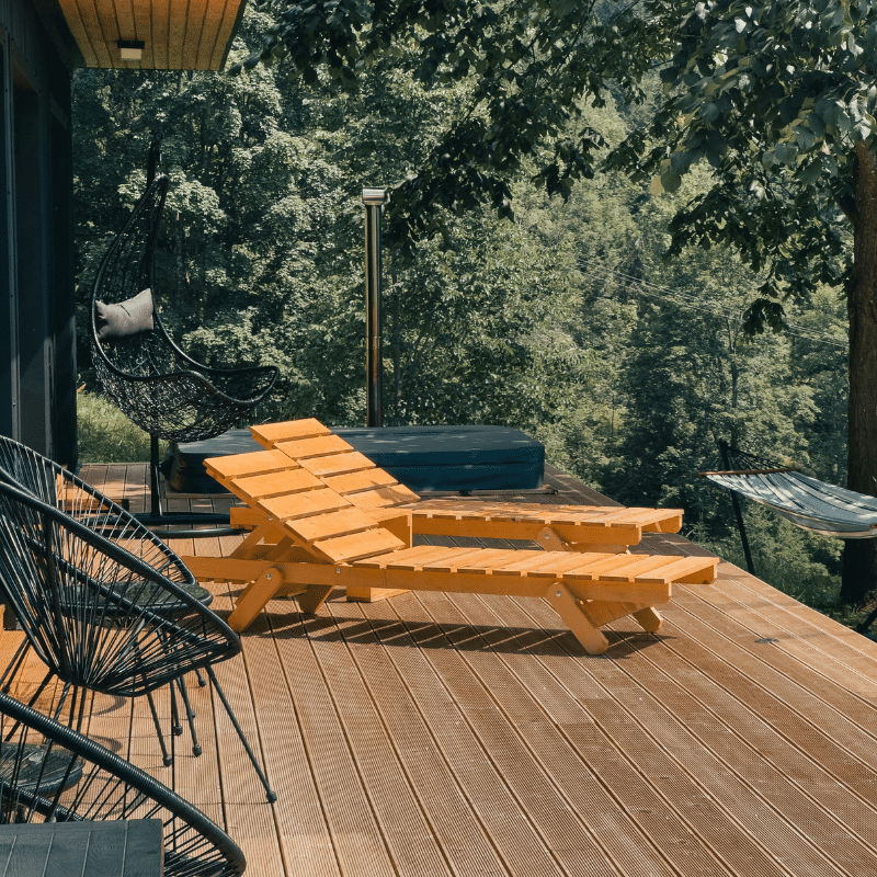 Composite deck with tan decking by Nelson Exteriors in Marietta, GA