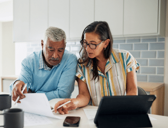 Homeowners reviewing project details with Nelson Exteriors in Marietta, GA