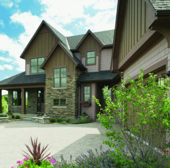 Residential home with neutral-toned siding installed by Nelson Exteriors in Marietta, GA