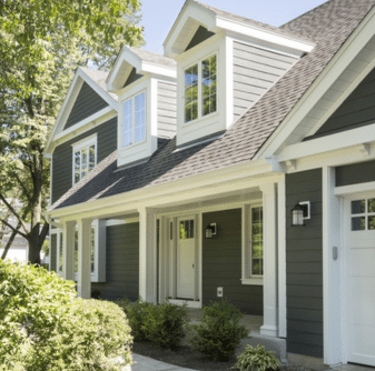 Residential home with blue-gray siding installed by Nelson Exteriors in Marietta, GA