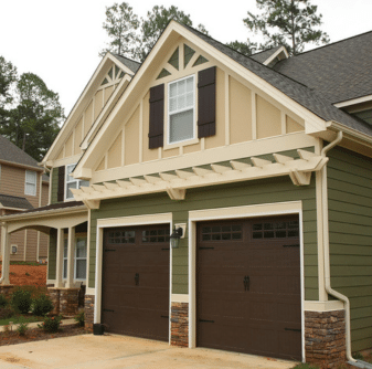Residential home with tan and green siding installed by Nelson Exteriors in Marietta, GA